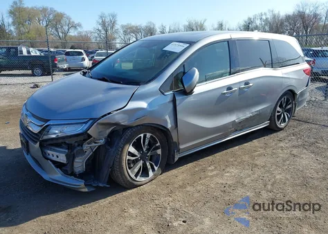 2018 Honda Odyssey Elite z USA, uszkodzony, nr VIN 5FNRL6H91JB070355